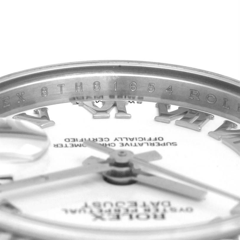 The image shows a close-up of the dial and inner rim of a Rolex Datejust 179174 Women's Stainless Steel White Dial 179174 Women's Stainless Steel White Dial watch with model numbers inscribed.