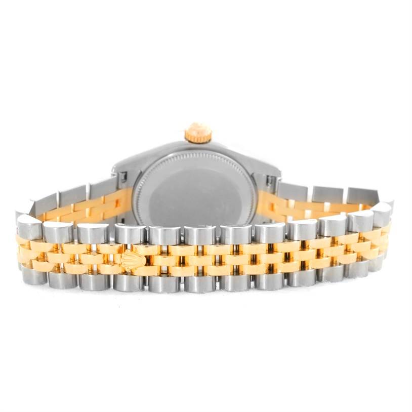 The image shows the back view of a Rolex Datejust 179173 Women's Steel and Gold (two tone) White Dial 179173 Women's Steel and Gold (two tone) White Dial watch, including the case back and the two-tone bracelet.