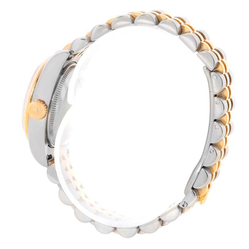 This image shows the side view of a Rolex Datejust 179173 Women's Steel and Gold (two tone) White Dial 179173 Women's Steel and Gold (two tone) White Dial watch, highlighting the crown and the two-tone bracelet.