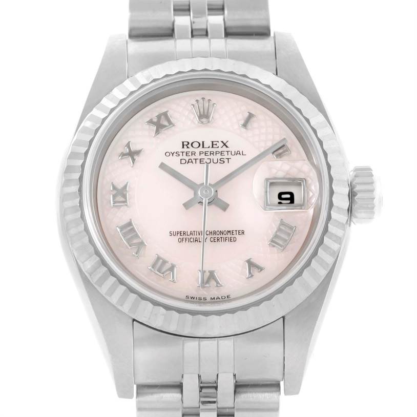 The image shows a front view of the Rolex Datejust 79174 Women's Stainless Steel Mother of Pearl Dial 79174 Women's Stainless Steel Mother of Pearl Dial watch, highlighting its pink dial, Roman numerals, and date window.