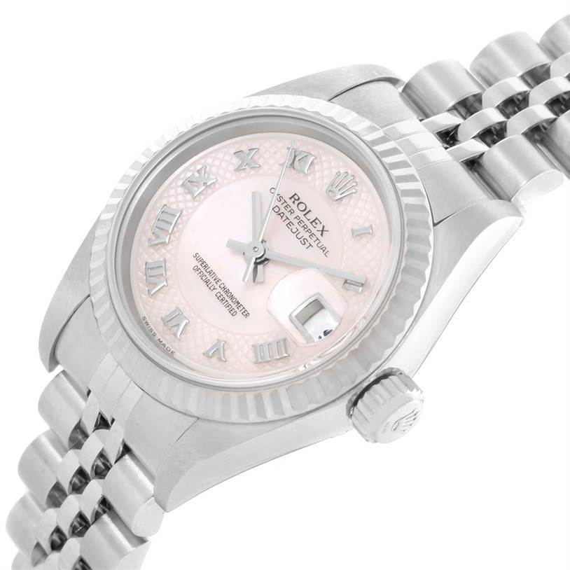 The Rolex Datejust 79174 Women's Stainless Steel Mother of Pearl Dial 79174 Women's Stainless Steel Mother of Pearl Dial watch is shown at a three-quarter angle, highlighting its pink dial, Roman numerals, bezel, crown, and Jubilee bracelet.