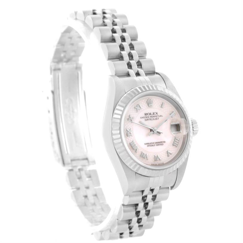 This image shows a Rolex Datejust 79174 Women's Stainless Steel Mother of Pearl Dial 79174 Women's Stainless Steel Mother of Pearl Dial watch from a slightly angled side view, showcasing its bracelet, face, and bezel.