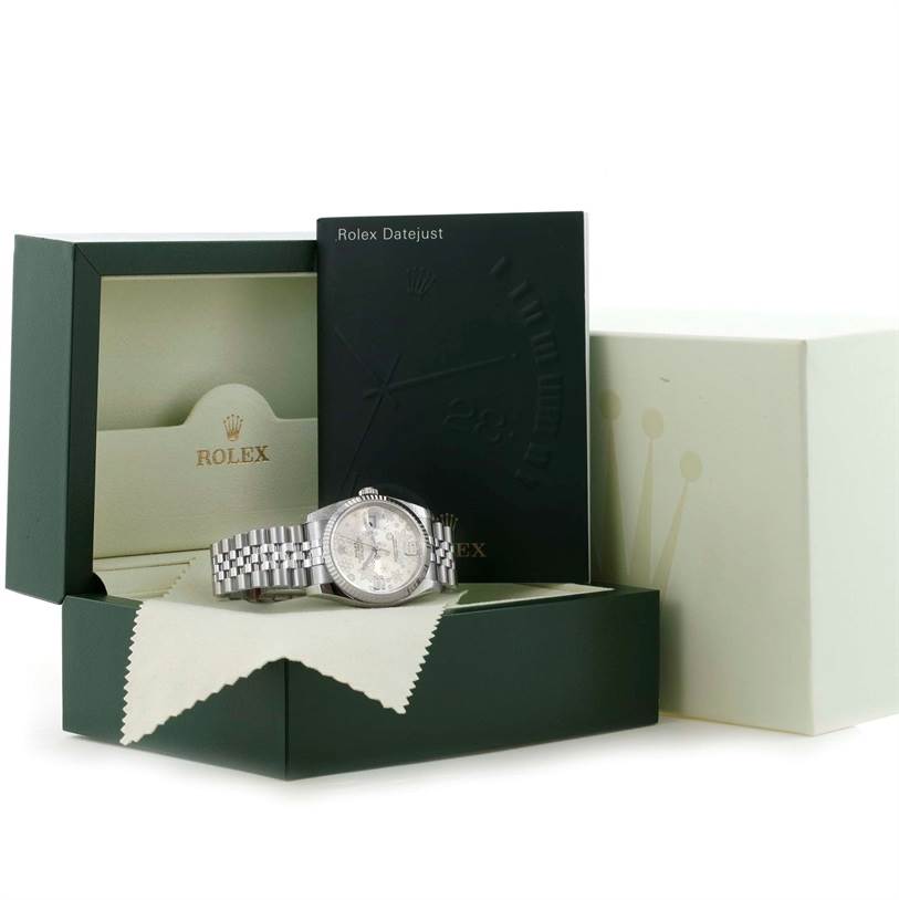 The image shows the Rolex Datejust 116234 Stainless Steel Silver Dial 116234 Stainless Steel Silver Dial watch placed in its box with its booklet and cleaning cloth visible.