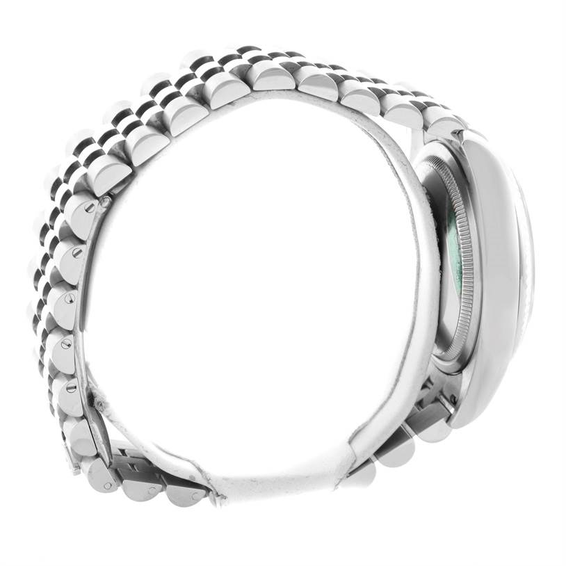 The image shows a side view of a Rolex Datejust 116234 Stainless Steel Silver Dial 116234 Stainless Steel Silver Dial watch, highlighting its case and bracelet.