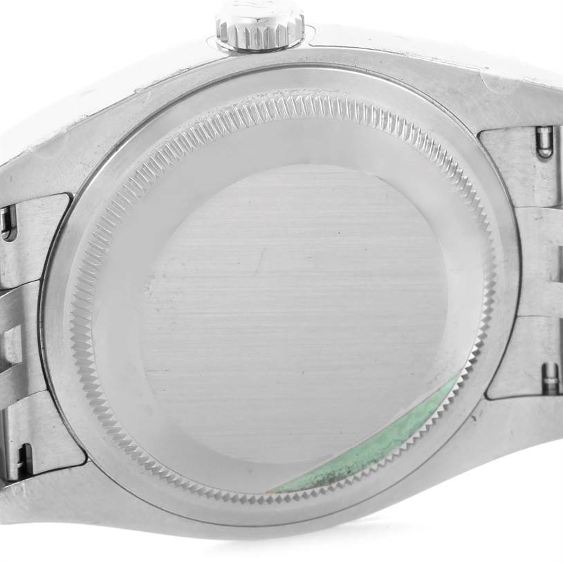 This image shows the back case and partial bracelet of a Rolex Datejust 116234 Stainless Steel Silver Dial 116234 Stainless Steel Silver Dial watch from a rear angle.