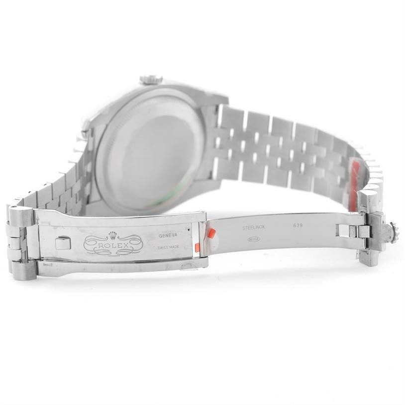 The image shows a Rolex Datejust 116234 Stainless Steel Silver Dial 116234 Stainless Steel Silver Dial watch from the rear angle, focusing on the opened clasp and part of the bracelet.