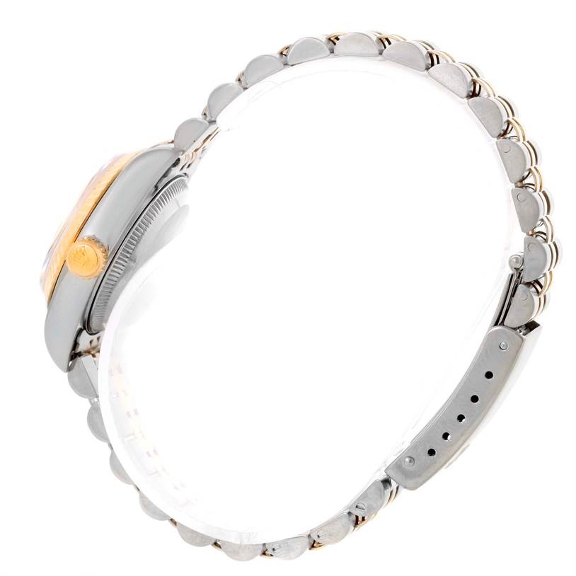 The image shows a side view of a Rolex Datejust 69173 Women's Stainless Steel Champagne Dial 69173 Women's Stainless Steel Champagne Dial watch, highlighting its case, crown, and bracelet.