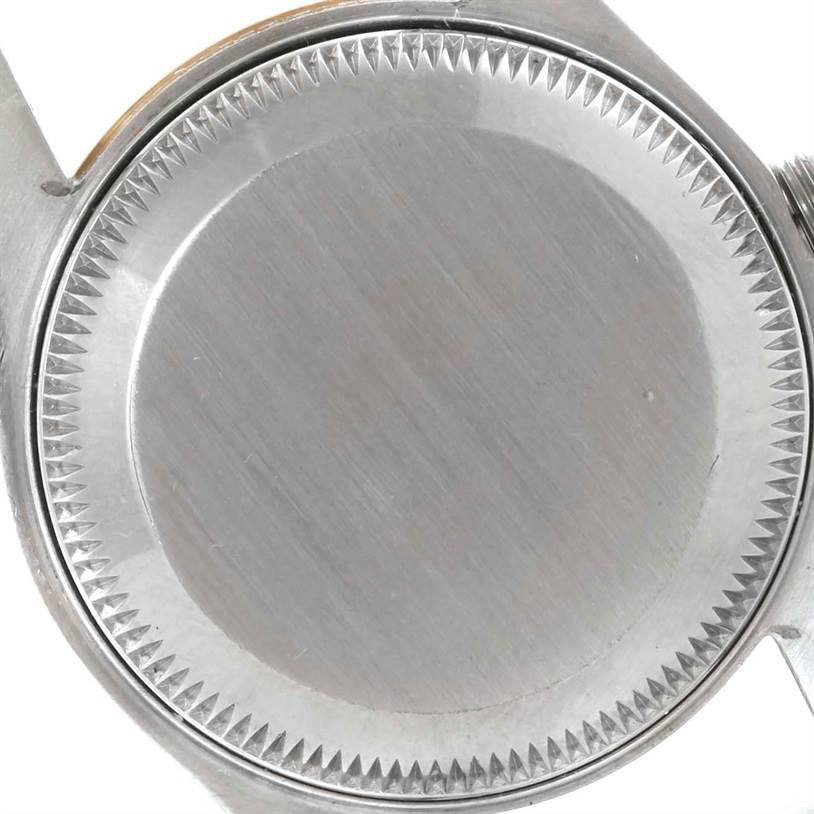 The image shows the back case of a Rolex Datejust 69173 Women's Stainless Steel Champagne Dial 69173 Women's Stainless Steel Champagne Dial watch, viewed from a top-down angle.