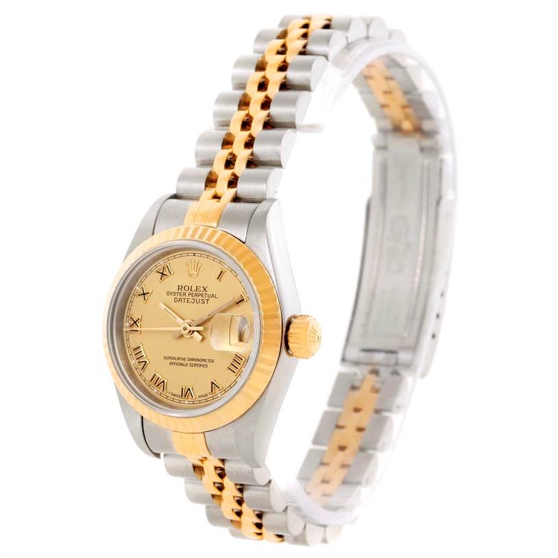 This image shows a side angle of a Rolex Datejust 69173 Women's Stainless Steel Champagne Dial 69173 Women's Stainless Steel Champagne Dial watch, highlighting its gold and silver bracelet, bezel, and face.