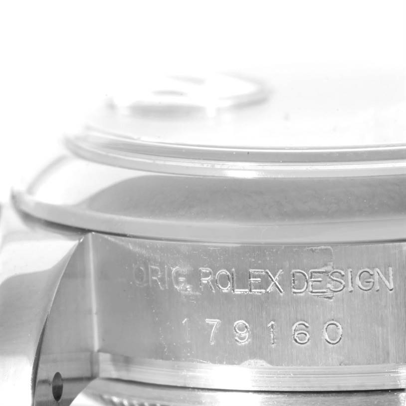 The angled image shows the side of a Rolex Datejust 179160 Women's Stainless Steel White Dial 179160 Women's Stainless Steel White Dial watch case, featuring engravings including "ORIG ROLEX DESIGN" and the model number "179160".