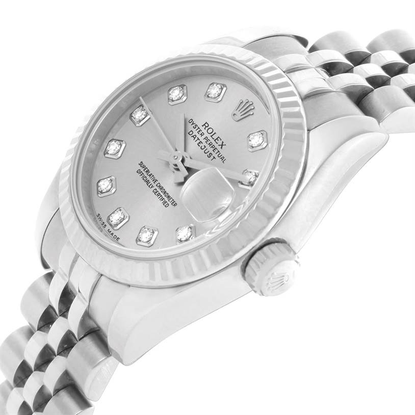 The Rolex Datejust 179174 Women's Stainless Steel Silver Dial 179174 Women's Stainless Steel Silver Dial watch is shown at an angle highlighting the face, dial, bezel, case, and a portion of the bracelet.