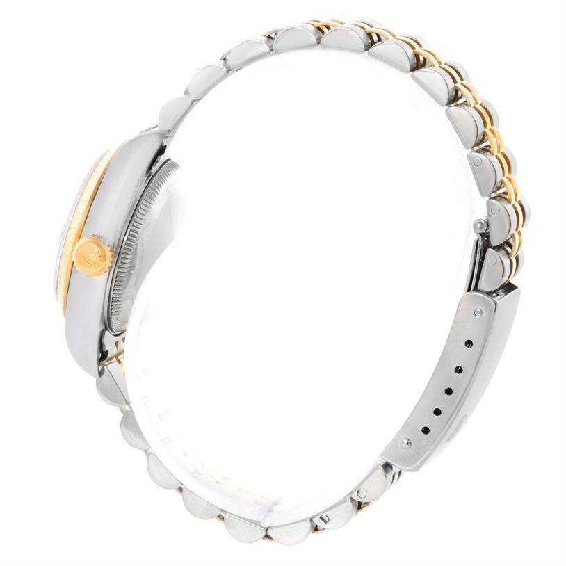 This image shows a side view of a Rolex Datejust 79173 Women's Stainless Steel Blue Dial 79173 Women's Stainless Steel Blue Dial watch, focusing on the crown, case, and bracelet.