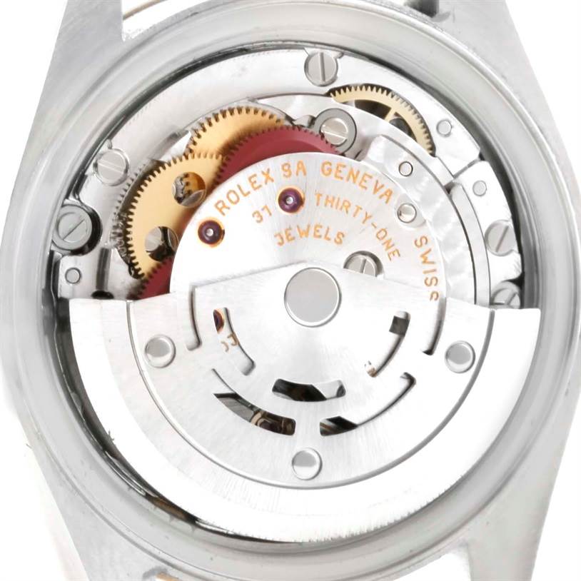 The image shows the open case back of a Rolex Datejust 79173 Women's Stainless Steel Blue Dial 79173 Women's Stainless Steel Blue Dial, revealing the internal mechanical movement components.