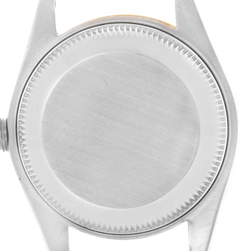 This image shows the case back and lugs of a Rolex Datejust 69173 Women's Stainless Steel Champagne Dial 69173 Women's Stainless Steel Champagne Dial watch from a top-down angle.