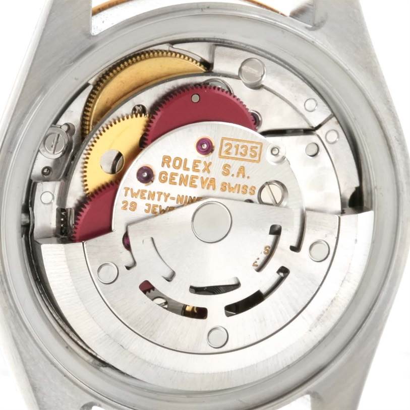 The image shows the movement and internal components of a Rolex Datejust 69173 Women's Stainless Steel Champagne Dial 69173 Women's Stainless Steel Champagne Dial watch from a rear angle.