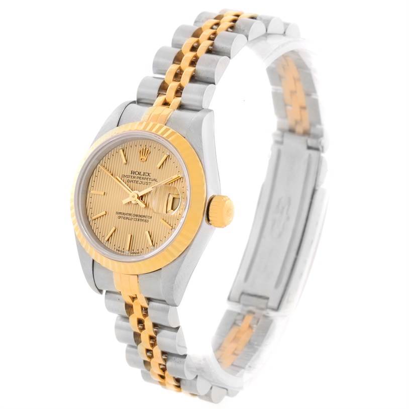 The Rolex Datejust 69173 Women's Stainless Steel Champagne Dial 69173 Women's Stainless Steel Champagne Dial watch is shown at an oblique angle, highlighting its face, crown, and two-tone bracelet.