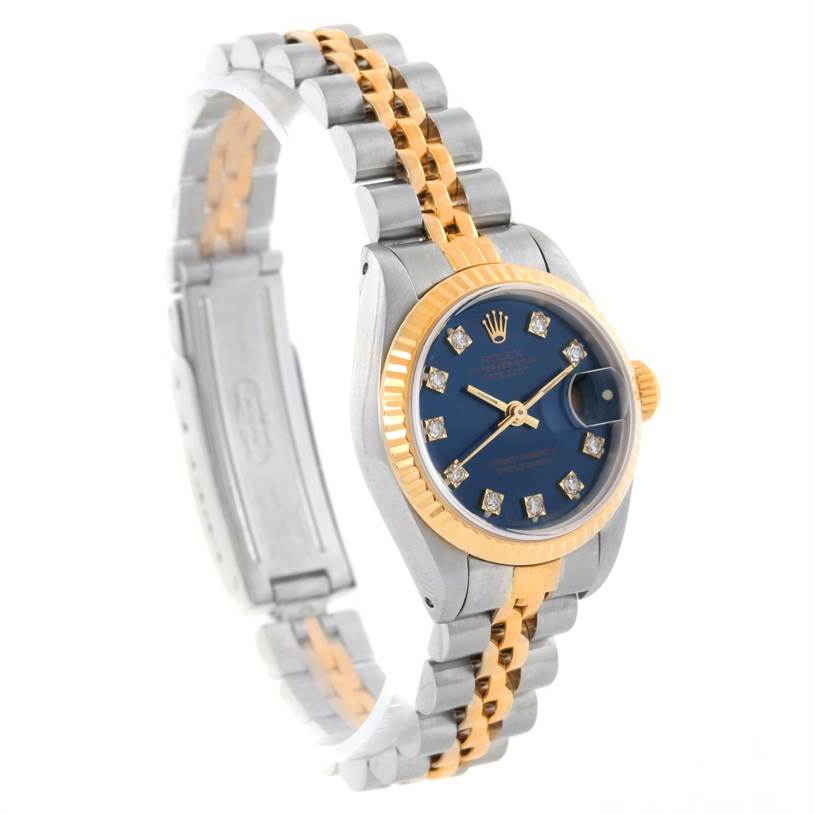 This is a side angle view of a Rolex Datejust 69173 Women
s Stainless Steel Blue Dial 69173 Women
s Stainless Steel Blue Dial watch, showcasing the face, bezel, crown, and two-tone bracelet.
