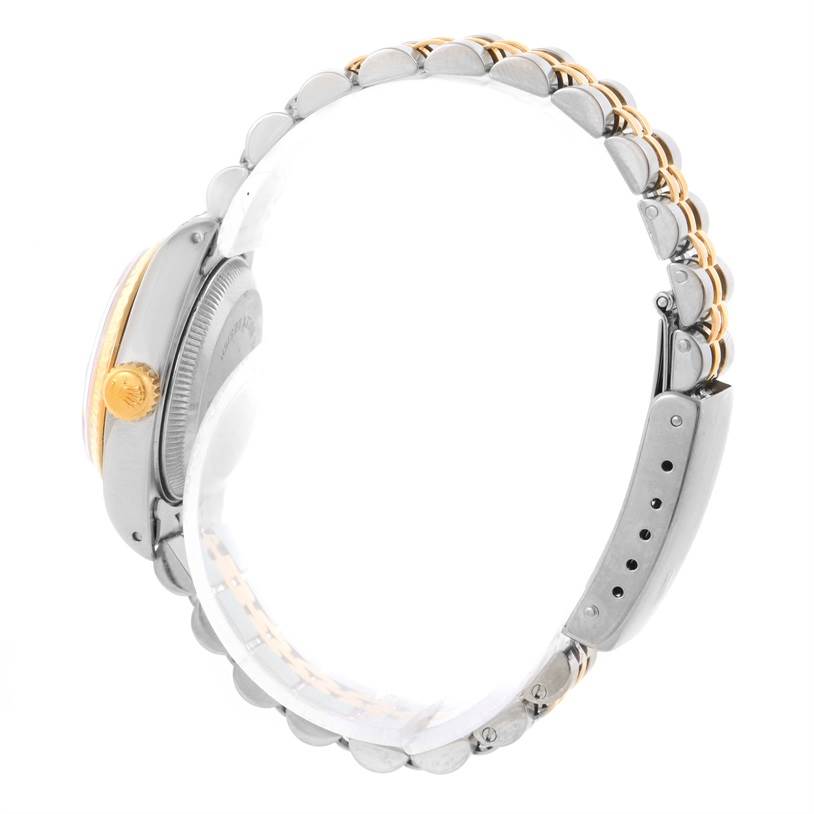 The image shows the side view of a Rolex Datejust 69173 Women
s Stainless Steel Blue Dial 69173 Women
s Stainless Steel Blue Dial watch, focusing on the crown and the link bracelet.