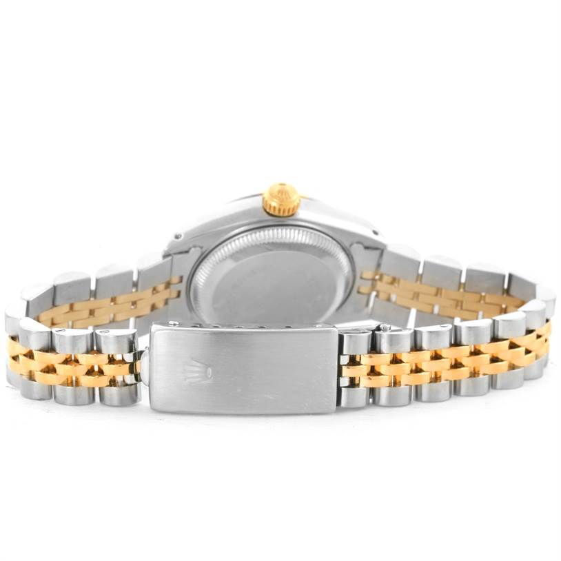 The image shows the back of a Rolex Datejust 69173 Women
s Stainless Steel Blue Dial 69173 Women
s Stainless Steel Blue Dial watch, highlighting the case back, crown, and metal bracelet with a clasp.