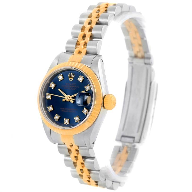 This image shows a Rolex Datejust 69173 Women
s Stainless Steel Blue Dial 69173 Women
s Stainless Steel Blue Dial watch at a slight angle, highlighting its blue dial, gold bezel, and two-tone bracelet.