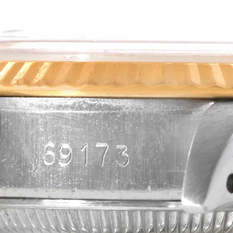The image shows a close-up of the case side, bezel, and model number of the Rolex Datejust 69173 Women
s Stainless Steel Blue Dial 69173 Women
s Stainless Steel Blue Dial 69173.