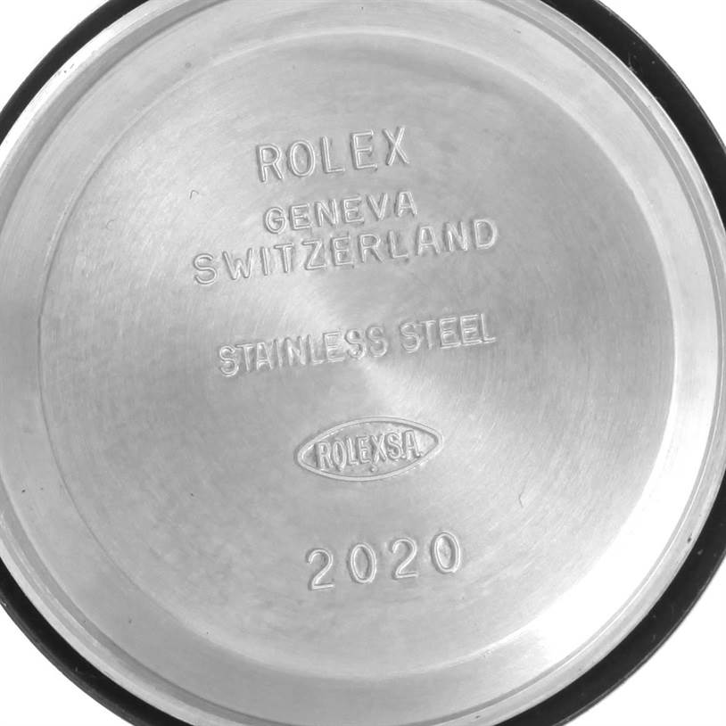 The image shows the interior of a Rolex Datejust 79163 Women
s Steel and Gold (two tone) Blue Dial 79163 Women
s Steel and Gold (two tone) Blue Dial
s case back, engraved with brand details and the year 2020.
