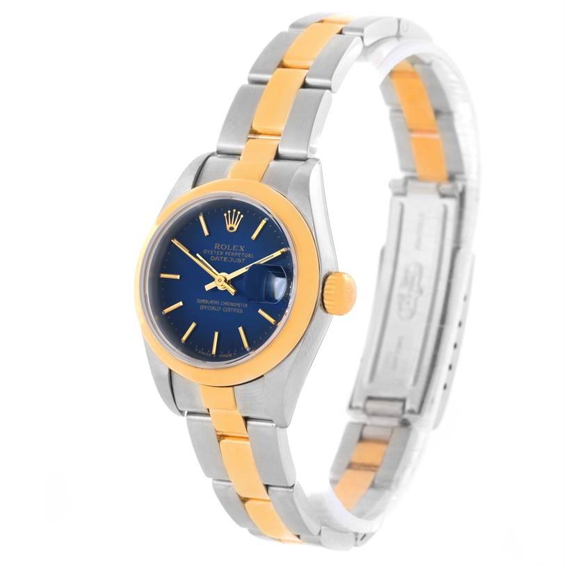 This image shows a Rolex Datejust 79163 Women
s Steel and Gold (two tone) Blue Dial 79163 Women
s Steel and Gold (two tone) Blue Dial watch at a side angle highlighting the bezel, dial, and bracelet.