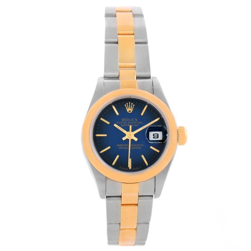 The Rolex Datejust 79163 Women
s Steel and Gold (two tone) Blue Dial 79163 Women
s Steel and Gold (two tone) Blue Dial watch is shown from the front, showcasing the face, bezel, dial, and partial bracelet.