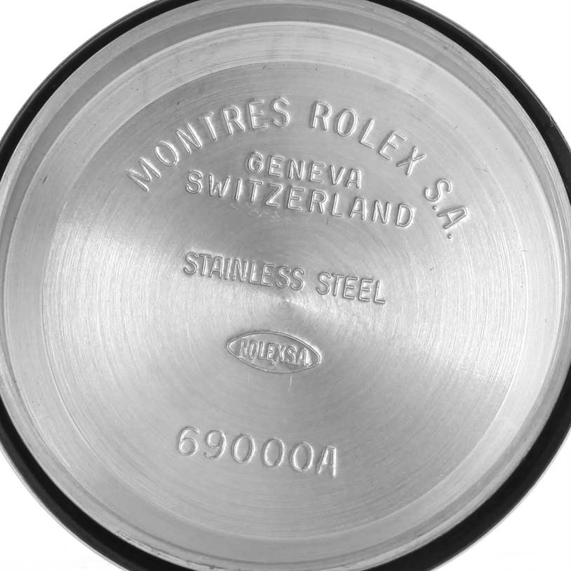 The image shows the inner case back of a Rolex Datejust 69174 Women
s Stainless Steel Pink Dial 69174 Women
s Stainless Steel Pink Dial watch, engraved with branding and material information.