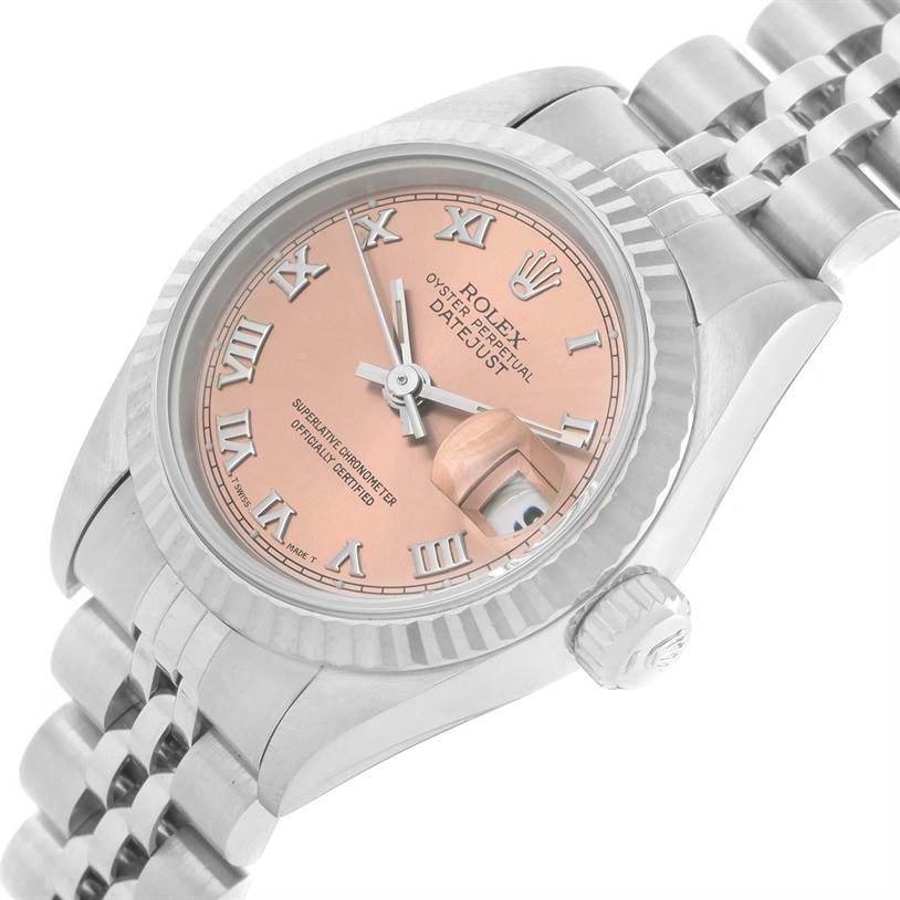 The image shows a close-up angled view of a Rolex Datejust 69174 Women
s Stainless Steel Pink Dial 69174 Women
s Stainless Steel Pink Dial watch, highlighting its face, bezel, crown, and part of the bracelet.