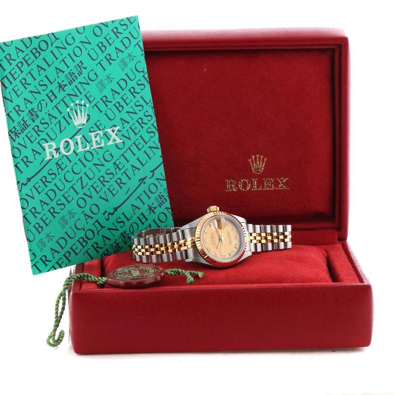 The Rolex Datejust 69173 Women's Stainless Steel Champagne Dial 69173 Women's Stainless Steel Champagne Dial watch is shown from a front angle, in its box with warranty booklet and tag.