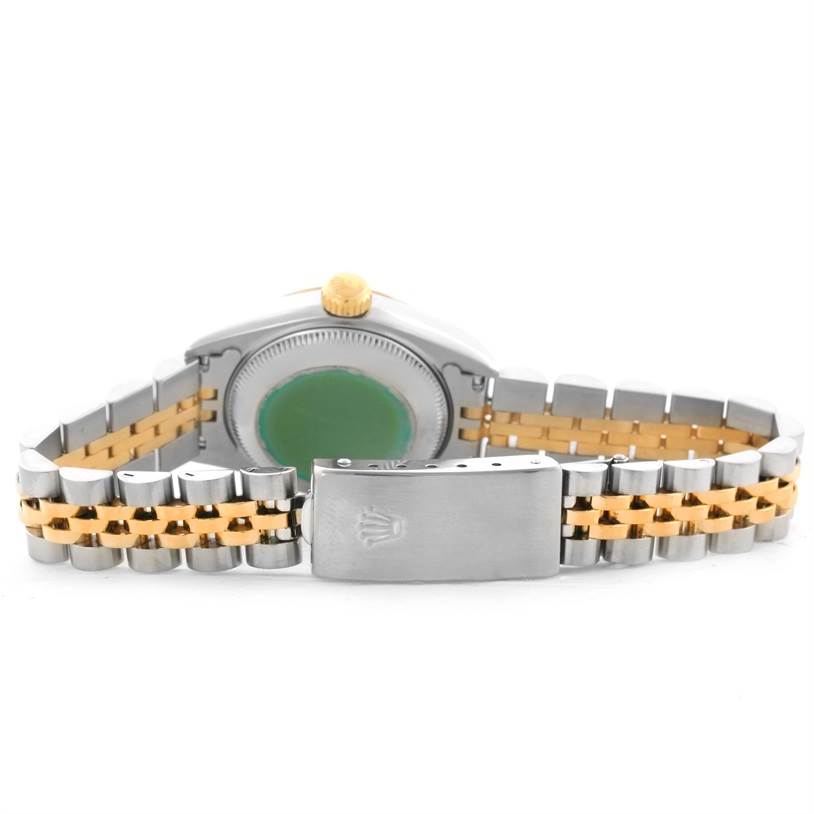 The image shows the back view of a Rolex Datejust 69173 Women's Stainless Steel Champagne Dial 69173 Women's Stainless Steel Champagne Dial watch, highlighting its bracelet, clasp, and case back.