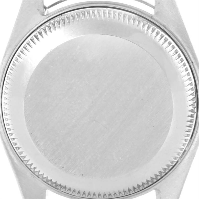 This image shows the bezel and unfinished case of a Rolex Datejust 79174 Women
s Stainless Steel Mother of Pearl Dial 79174 Women
s Stainless Steel Mother of Pearl Dial watch from a top-down angle.