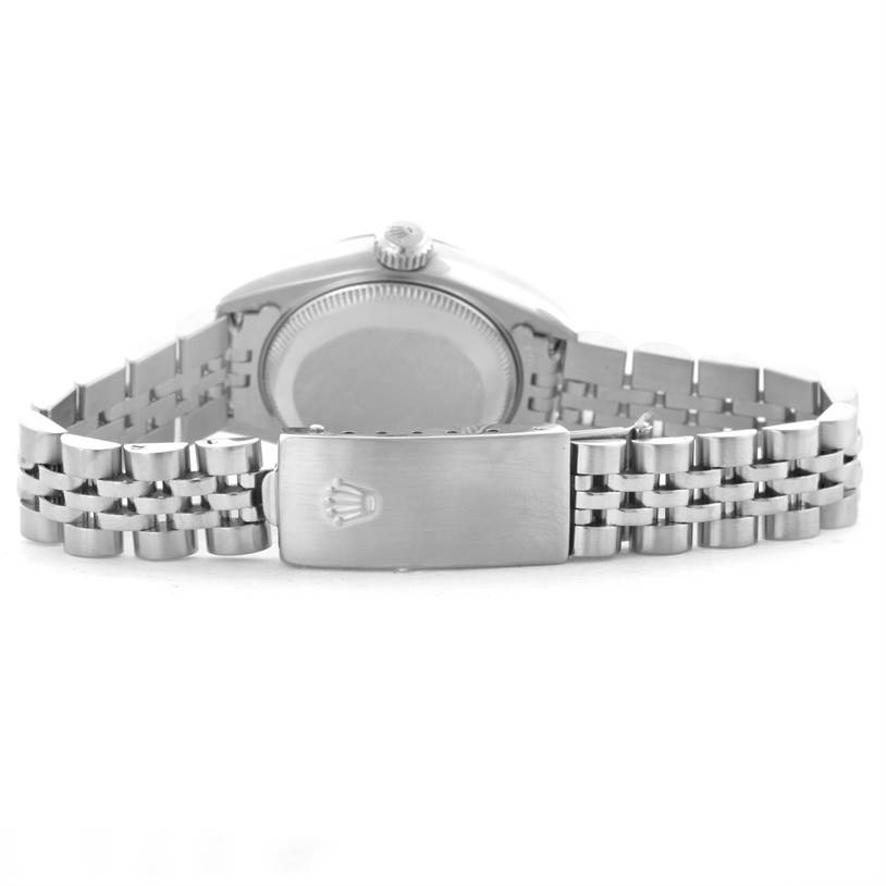 The image shows the rear angle of the Rolex Datejust 79174 Women
s Stainless Steel Blue Dial 79174 Women
s Stainless Steel Blue Dial watch, highlighting its stainless steel clasp and bracelet.