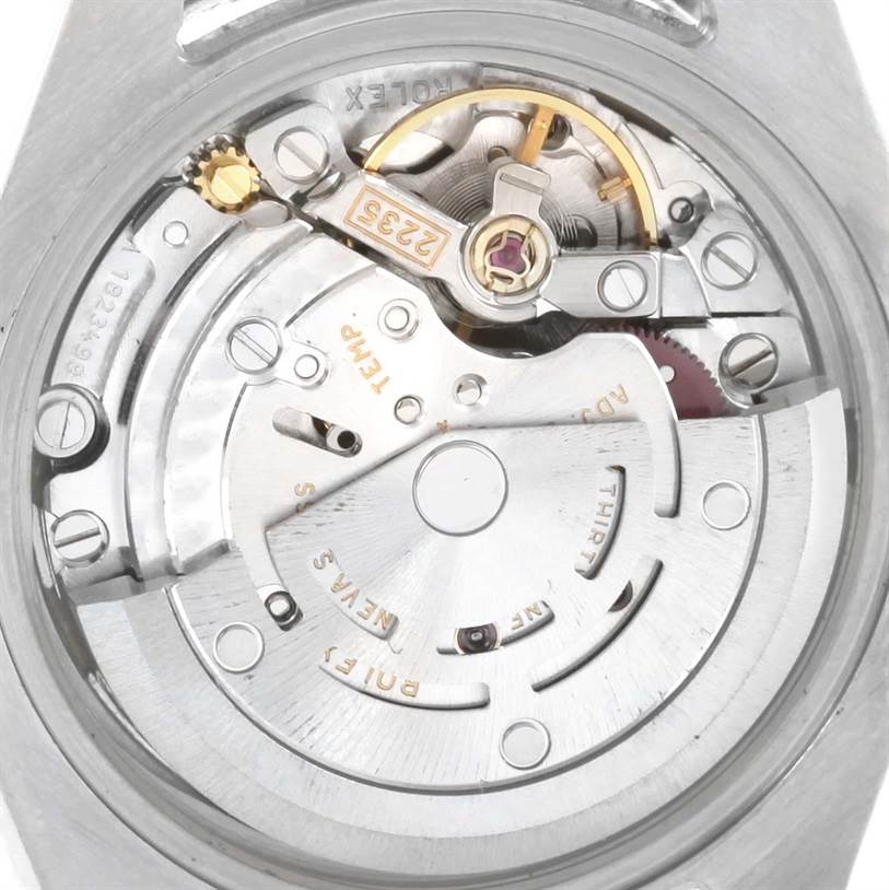 This image shows the inner mechanics and movement of a Rolex Datejust 179173 Women's Steel and Gold (two tone) White Dial 179173 Women's Steel and Gold (two tone) White Dial watch from the case back view.