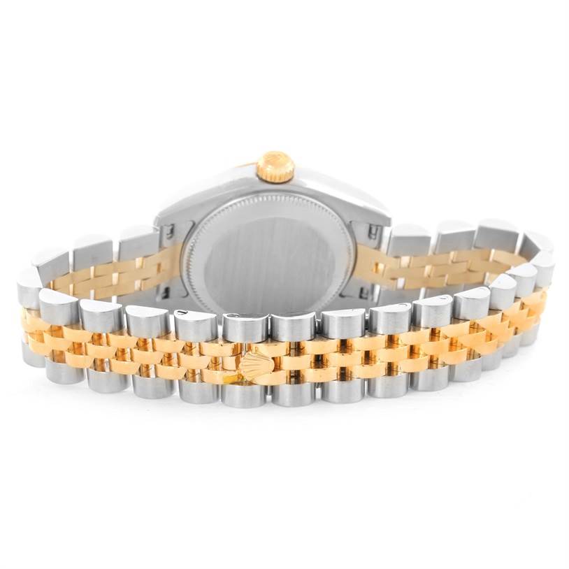 The image shows the back and bracelet of a Rolex Datejust 179173 Women's Steel and Gold (two tone) White Dial 179173 Women's Steel and Gold (two tone) White Dial watch, featuring a two-tone design.