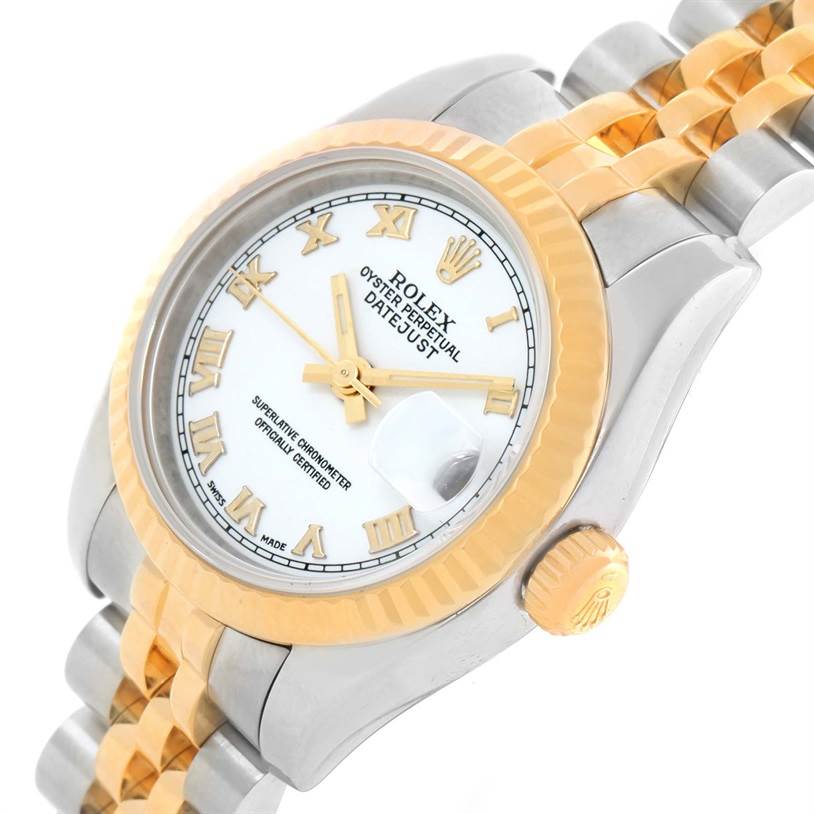 This image shows a Rolex Datejust 179173 Women's Steel and Gold (two tone) White Dial 179173 Women's Steel and Gold (two tone) White Dial watch at an angle, highlighting the face, bezel, crown, and part of the bracelet.