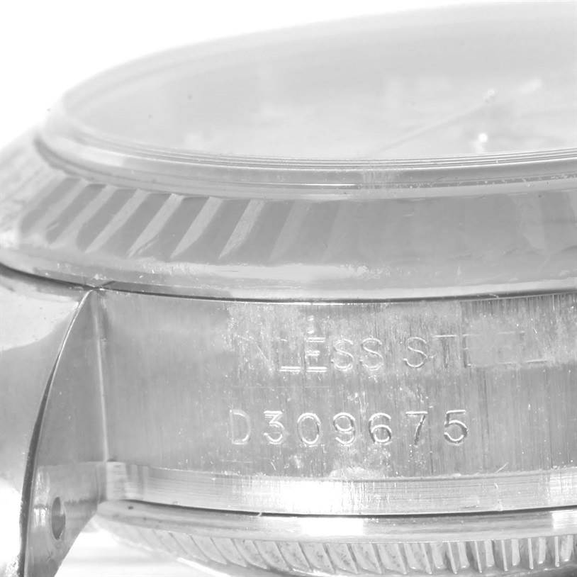 This close-up image shows the side profile and engraving on a Rolex Datejust 179174 Women
s Stainless Steel Mother of Pearl Dial 179174 Women
s Stainless Steel Mother of Pearl Dial watch case.