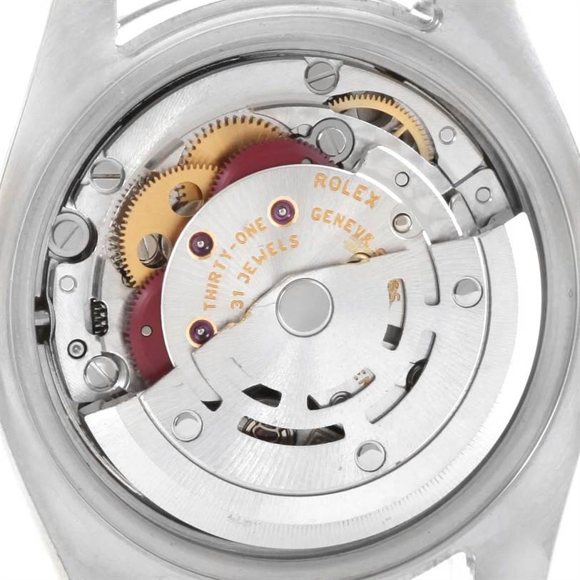 This image shows the inner mechanism and movement components of the Rolex Datejust 179174 Women
s Stainless Steel Mother of Pearl Dial 179174 Women
s Stainless Steel Mother of Pearl Dial watch from a rear, close-up angle.