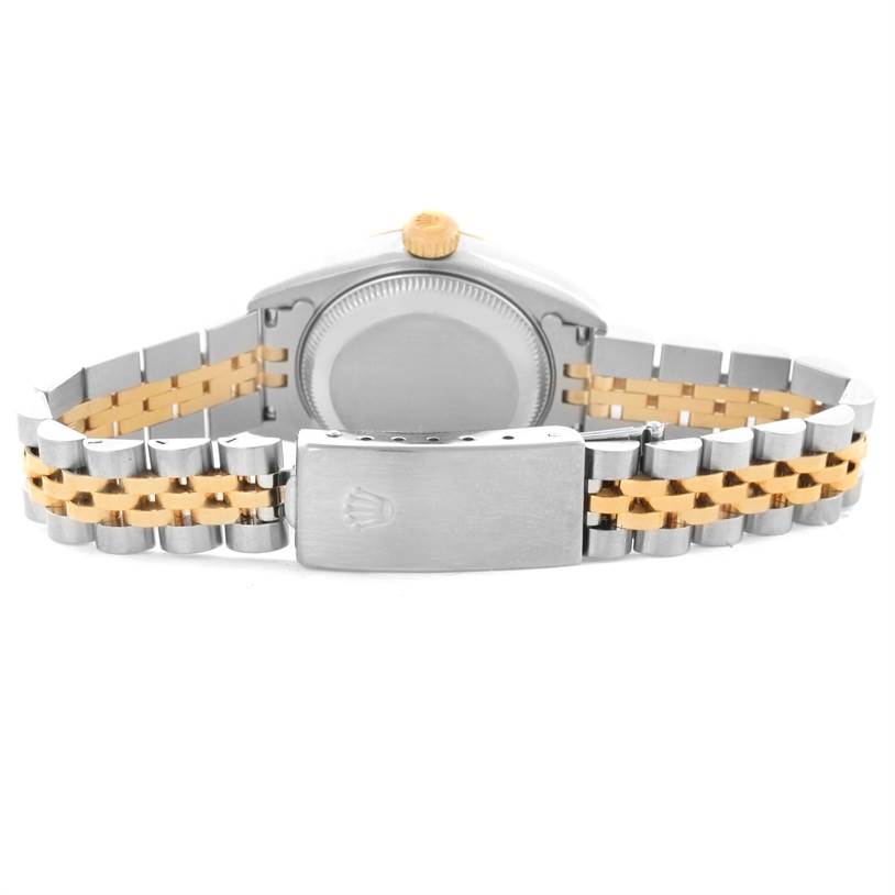 This Rolex Datejust 69173 Women's Stainless Steel Champagne Dial 69173 Women's Stainless Steel Champagne Dial watch is shown from the back angle, highlighting its clasp, case back, and bicolored bracelet.