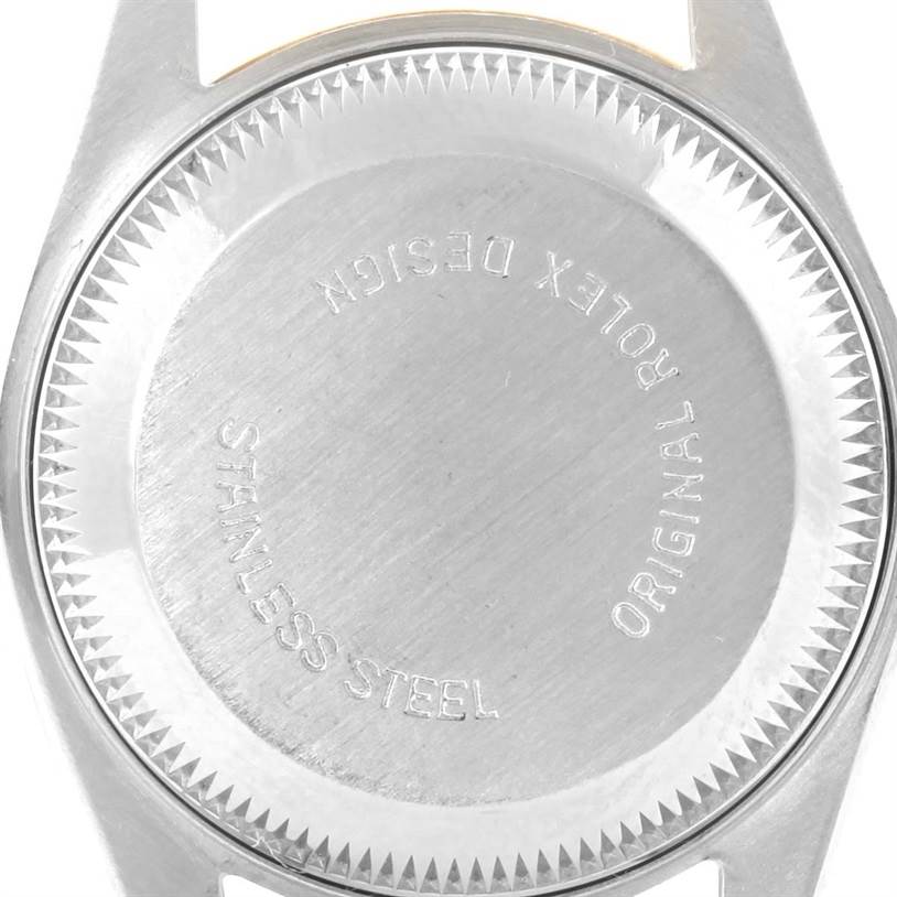 This image shows the back case of a Rolex Datejust 69173 Women's Stainless Steel Mother of Pearl Dial 69173 Women's Stainless Steel Mother of Pearl Dial watch in stainless steel from a top-down angle.