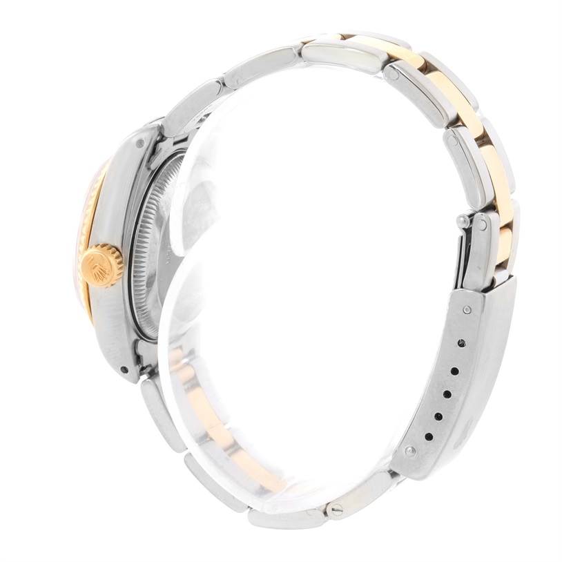 The image shows a side view of the Rolex Datejust 69173 Women's Stainless Steel Mother of Pearl Dial 69173 Women's Stainless Steel Mother of Pearl Dial watch, highlighting its crown and two-tone bracelet.