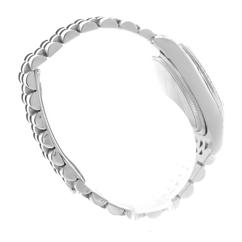 The Rolex Datejust 116244PFAO Women's Stainless Steel Pink Dial 116244PFAO Women's Stainless Steel Pink Dial watch is shown from a side angle, highlighting its bracelet and partially visible case.