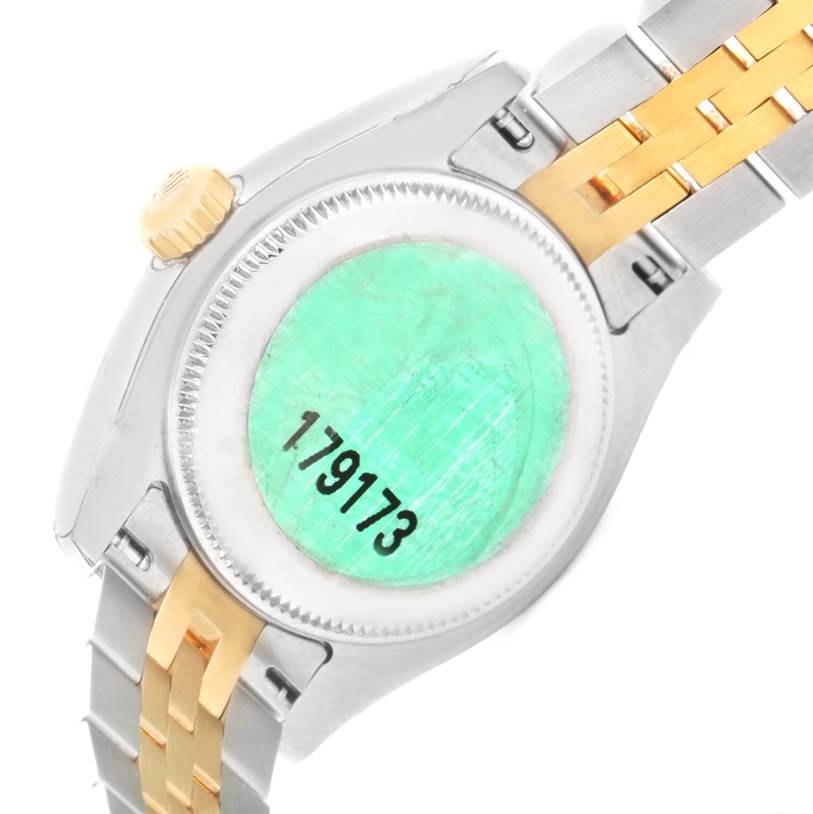This image shows the back casing and part of the bracelet of a Rolex Datejust 179173 Women's Steel and Gold (two tone) White Dial 179173 Women's Steel and Gold (two tone) White Dial watch, highlighting its model number.