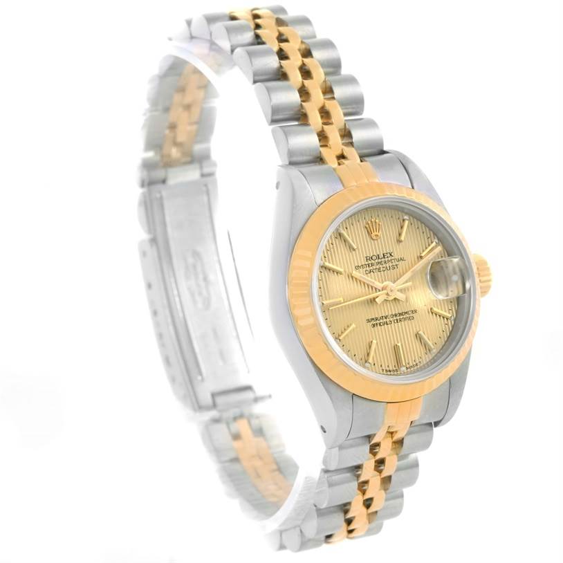 This image shows a Rolex Datejust 69173 Women's Stainless Steel Champagne Dial 69173 Women's Stainless Steel Champagne Dial watch at a slight angle, highlighting its face, bezel, and two-tone bracelet.