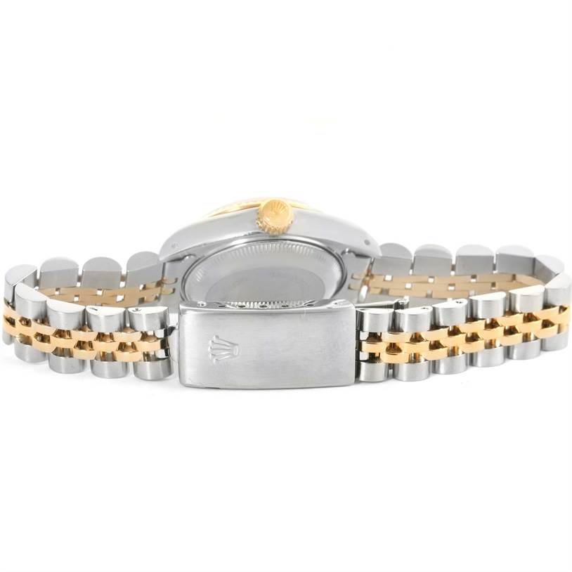 The image shows the backside of a Rolex Datejust 69173 Women's Stainless Steel Champagne Dial 69173 Women's Stainless Steel Champagne Dial watch, highlighting its jubilee bracelet and clasp.