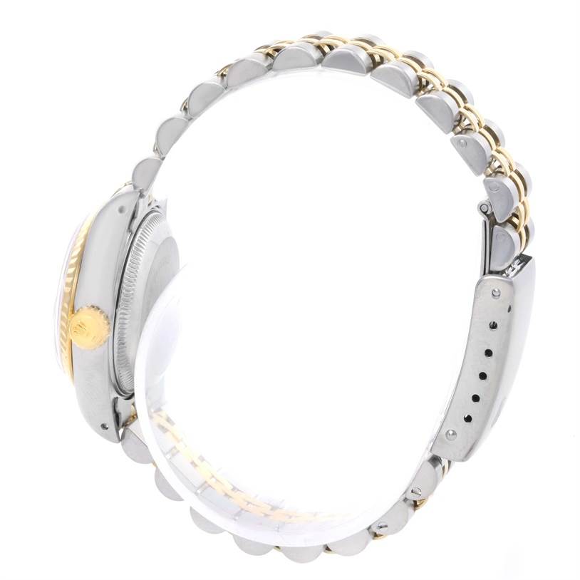 The image shows a Rolex Datejust 69173 Women's Stainless Steel Champagne Dial 69173 Women's Stainless Steel Champagne Dial watch from a side angle, highlighting its bracelet and crown.