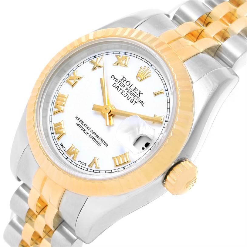The image shows a Rolex Datejust 179173 Women's Steel and Gold (two tone) White Dial 179173 Women's Steel and Gold (two tone) White Dial model watch viewed from a slightly tilted angle, highlighting its face, crown, and two-tone bracelet.