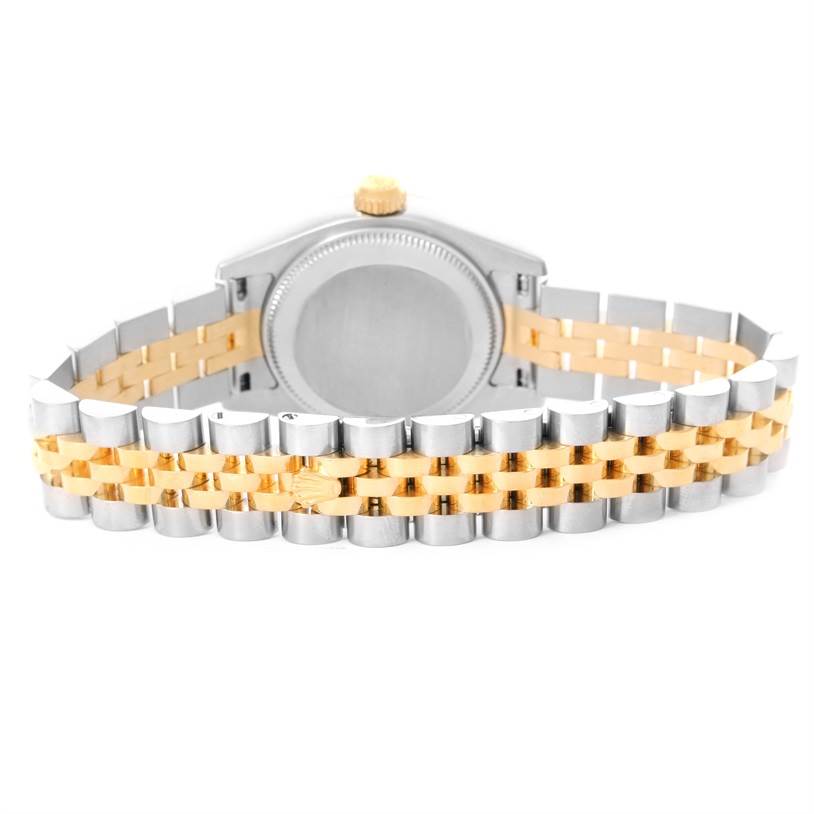 The image shows the back view of a Rolex Datejust 179173 Women's Steel and Gold (two tone) White Dial 179173 Women's Steel and Gold (two tone) White Dial watch, highlighting its stainless steel and gold Jubilee bracelet.