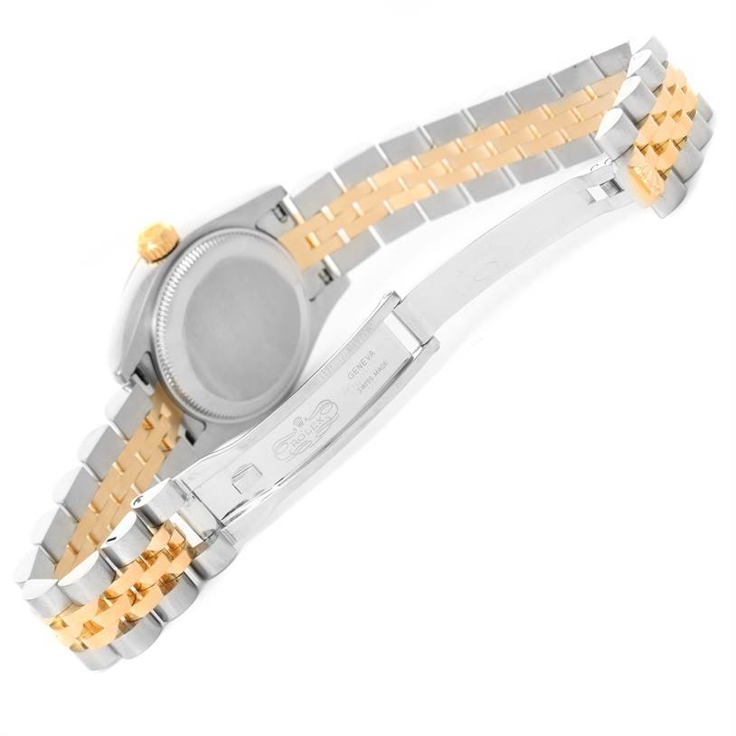 The image shows the back of a Rolex Datejust 179173 Women's Steel and Gold (two tone) White Dial 179173 Women's Steel and Gold (two tone) White Dial watch, highlighting its case, bracelet, and clasp.